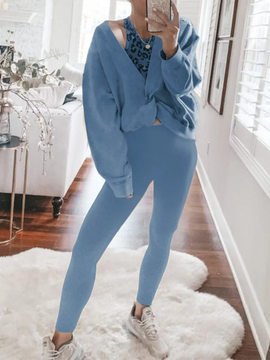 Two-piece Suit with Fashionable Top and Solid Color Tights