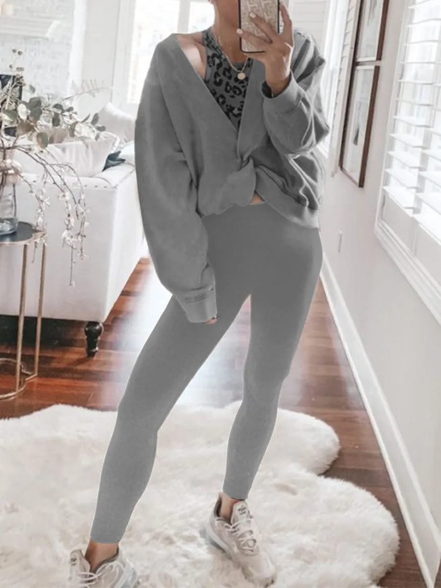 Two-piece Suit with Fashionable Top and Solid Color Tights