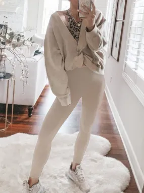 Two-piece Suit with Fashionable Top and Solid Color Tights